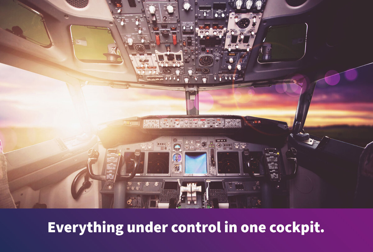 View from the cockpit of a commercial airliner, featuring numerous instruments and control panels. A sunset is visible through the windshield, casting a warm glow across the cockpit. Along the bottom edge of the image, the text reads: &laquo;Full control in one cockpit.